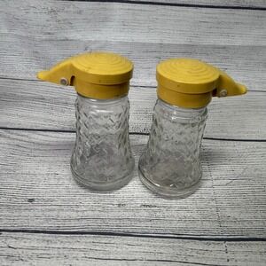 2 Antique Daniell's  Glass Yellow Plastic Flip Top Lid Shakers Salt Pepper